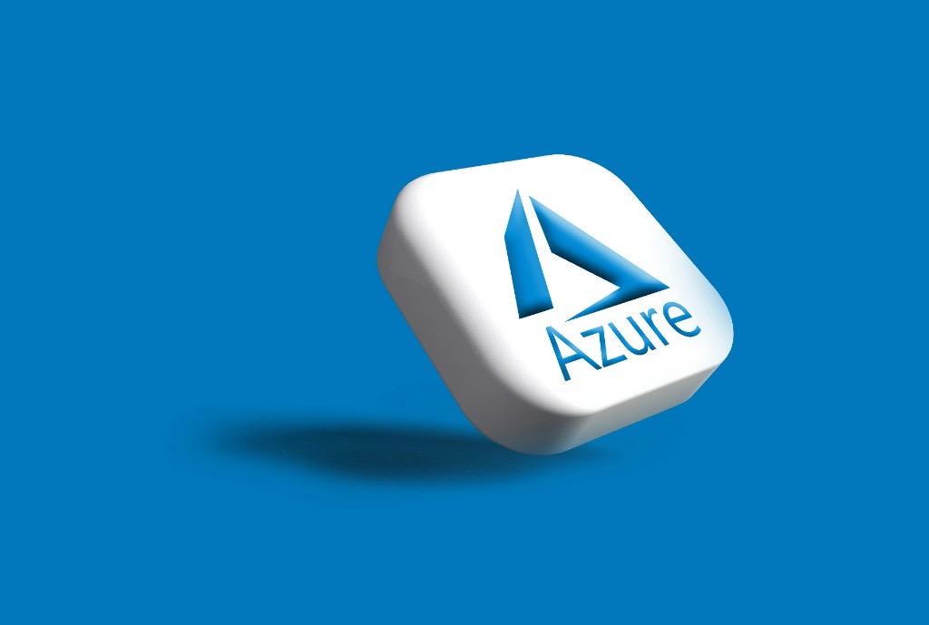 Microsoft Azure logo on a white tile against a blue background, representing an Azure subscription and management group redesign.